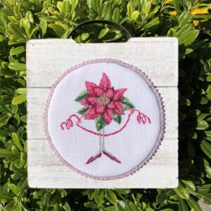 Miss Poinsettia by Keslyns Stitched With pink Thread
